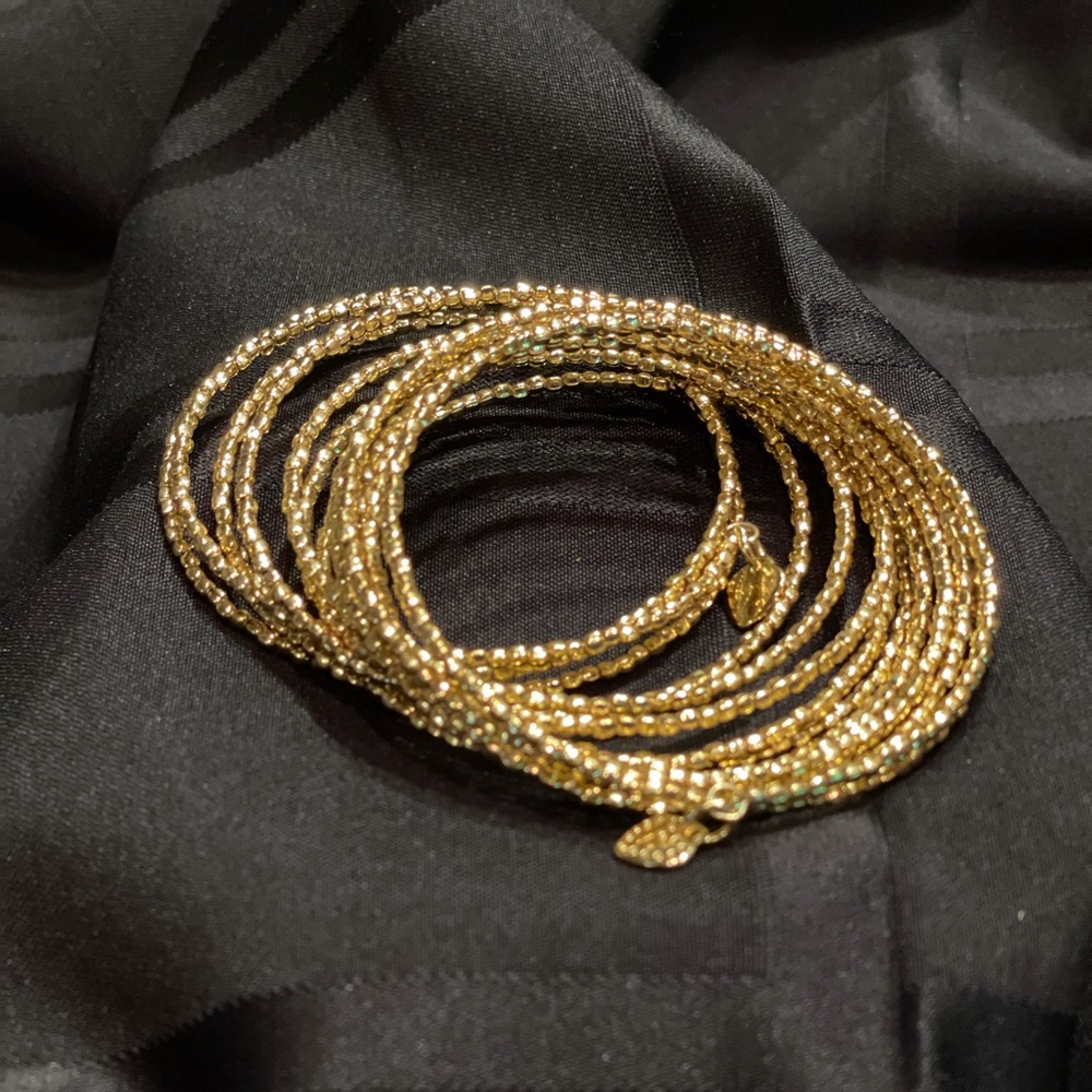 STELLA & DOT 15 row gold tone bangle bracelet
